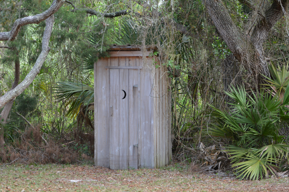 Why have the doors of outhouses crescent moons?